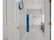 This bathroom hallway includes a water closet, tub, and access to the double sink ensuite bathroom at 10201 Los Padres Pl, Las Vegas, NV 89134
