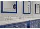 Bathroom featuring dual sinks and stunning marble countertops at 10201 Los Padres Pl, Las Vegas, NV 89134