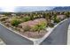 Charming single-story house with a tile roof, low-water landscaping, and a corner lot in a peaceful neighborhood setting at 10201 Los Padres Pl, Las Vegas, NV 89134