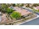 Attractive single-level house with desert landscaping, a tile roof, and enclosed yard situated in a quiet neighborhood at 10201 Los Padres Pl, Las Vegas, NV 89134