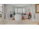 Bright and airy living room featuring elegant columns, neutral decor, and light wood flooring at 10201 Los Padres Pl, Las Vegas, NV 89134