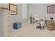 Home office with neutral colored walls, carpet, a white desk and chair at 10201 Los Padres Pl, Las Vegas, NV 89134
