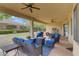 Spacious covered patio features an outdoor dining and sitting area, perfect for entertaining guests at 10201 Los Padres Pl, Las Vegas, NV 89134
