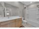 Well-lit bathroom with vanity, sink, and tub/shower combination at 10254 Kesington Dr, Las Vegas, NV 89135
