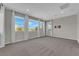 Bright bedroom with multiple large windows, neutral walls, and recessed lighting at 10254 Kesington Dr, Las Vegas, NV 89135