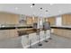 Well-appointed kitchen features sleek countertops, stainless steel appliances, and a functional center island at 10254 Kesington Dr, Las Vegas, NV 89135