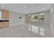 Spacious living area with modern floors, ample natural light, and an open concept design at 10254 Kesington Dr, Las Vegas, NV 89135