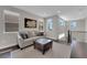 Living room with modern furnishings and natural light at 10254 Kesington Dr, Las Vegas, NV 89135