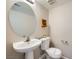 Small half-bath with modern fixtures at 10719 Tottenham Ave, Las Vegas, NV 89135