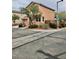 Charming two-story home featuring a tile roof, neat landscaping, and an attached two-car garage at 10719 Tottenham Ave, Las Vegas, NV 89135