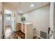 Hallway with wood floors and built-in cabinets at 10719 Tottenham Ave, Las Vegas, NV 89135