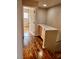 Upstairs hallway featuring beautiful wood floors at 10719 Tottenham Ave, Las Vegas, NV 89135