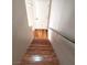 Staircase featuring beautiful wood floors at 10719 Tottenham Ave, Las Vegas, NV 89135