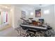 A bonus room with musical instruments and leopard print rug for added style and comfort at 10987 Kingston Fields Ave, Las Vegas, NV 89166