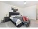 Comfortable bedroom featuring carpeted floor and stylish furnishings for a restful retreat at 10987 Kingston Fields Ave, Las Vegas, NV 89166
