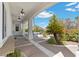 Covered patio with ceiling fans provides shade and comfort for outdoor entertaining at 11 Caminito Amore, Henderson, NV 89011