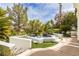 Landscaped water feature with modern fountain and desert vegetation at 11 Caminito Amore, Henderson, NV 89011
