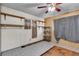 Bedroom with shelving and wood-paneled walls at 1317 Pyramid Dr, Las Vegas, NV 89108