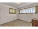 Bedroom with large windows and tile flooring at 1317 Pyramid Dr, Las Vegas, NV 89108