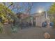 Backyard view featuring desert landscaping, covered patio, and house exterior at 146 Cascade Dr, Henderson, NV 89074