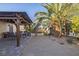 Inviting backyard with covered patio, desert landscaping, and seating area at 146 Cascade Dr, Henderson, NV 89074