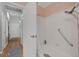 Bathroom featuring walk-in shower, wooden vanity, and hallway access at 146 Cascade Dr, Henderson, NV 89074
