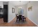 Dining room with wood floors, a dining table, and a chandelier at 146 Cascade Dr, Henderson, NV 89074