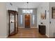 Bright foyer featuring hardwood floors and a display cabinet, setting an elegant tone at 146 Cascade Dr, Henderson, NV 89074