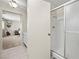 Bathroom with walk-in shower and view to bedroom with deer head wall decor at 1513 Marita Dr, Boulder City, NV 89005