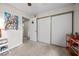 Bedroom featuring carpet flooring, closet with sliding doors, and ample space for furniture at 1513 Marita Dr, Boulder City, NV 89005