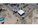 Wide aerial view of property showing home, outbuildings, desert landscaping, and a pool at 1540 Labrador St, Pahrump, NV 89048