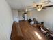 Bedroom with hardwood floors, a ceiling fan, and a storage closet at 1540 Labrador St, Pahrump, NV 89048