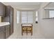 Cozy kitchen nook featuring a small table and a bright, window-filled space at 1709 Autumn Rust Dr, Las Vegas, NV 89119