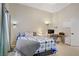 Relaxing main bedroom features vaulted ceilings, ample natural light, and a convenient desk area at 1709 Autumn Rust Dr, Las Vegas, NV 89119