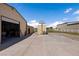 Exterior view of barn highlighting ample parking and adjacent storage area at 1988 N Moapa Valley Blvd, Logandale, NV 89021