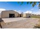 Exterior view of the barn highlighting ample parking and storage space at 1988 N Moapa Valley Blvd, Logandale, NV 89021