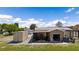Exterior view of the barn and storage area surrounded by a grassy field at 1988 N Moapa Valley Blvd, Logandale, NV 89021