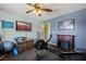 A well appointed exercise room featuring an electric fireplace and large television at 1988 N Moapa Valley Blvd, Logandale, NV 89021