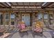 Charming front porch featuring comfortable seating and stylish brick accents at 1988 N Moapa Valley Blvd, Logandale, NV 89021