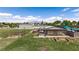 Aerial shot showing home, horse corral, and expansive lot, set against a backdrop of distant mountains at 1988 N Moapa Valley Blvd, Logandale, NV 89021