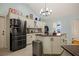 Modern kitchen with stainless steel appliances and spacious kitchen island at 1988 N Moapa Valley Blvd, Logandale, NV 89021