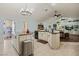 Spacious kitchen features an island, stainless steel appliances, and vaulted ceilings at 1988 N Moapa Valley Blvd, Logandale, NV 89021