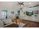Open-concept living room features a fireplace and built in storage at 1988 N Moapa Valley Blvd, Logandale, NV 89021