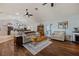 Spacious open-concept living room with hardwood floors connecting to an open kitchen at 1988 N Moapa Valley Blvd, Logandale, NV 89021