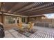 Inviting covered patio with stylish furniture for outdoor enjoyment, complemented by modern fixtures at 1988 N Moapa Valley Blvd, Logandale, NV 89021