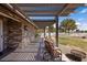 Comfortable covered patio featuring brick accents and peaceful outdoor seating at 1988 N Moapa Valley Blvd, Logandale, NV 89021