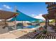 Beautiful backyard pool with patio seating and stone landscaping at 1988 N Moapa Valley Blvd, Logandale, NV 89021