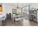 Well-lit dining area with modern table and chairs, adjacent to the kitchen, offers stylish convenience at 234 Priority Point St, Henderson, NV 89012