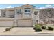 Charming two-story home with a two-car garage and well-maintained landscaping at 234 Priority Point St, Henderson, NV 89012
