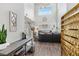 Bright living room with high ceilings, fireplace, and stylish decor create a welcoming atmosphere at 234 Priority Point St, Henderson, NV 89012